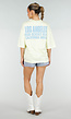 Lichtgeel Oversized T-shirt met Blauwe Tekst en Korte Mouwen