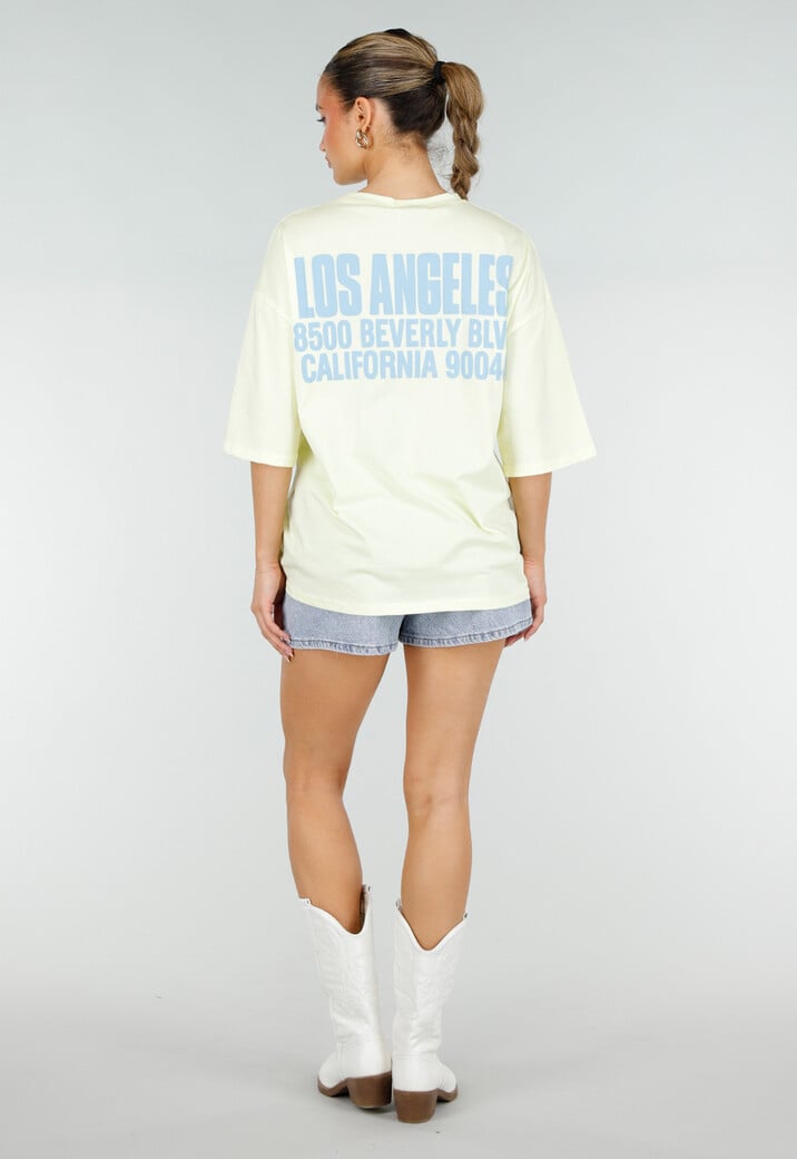 Lichtgeel Oversized T-shirt met Blauwe Tekst en Korte Mouwen