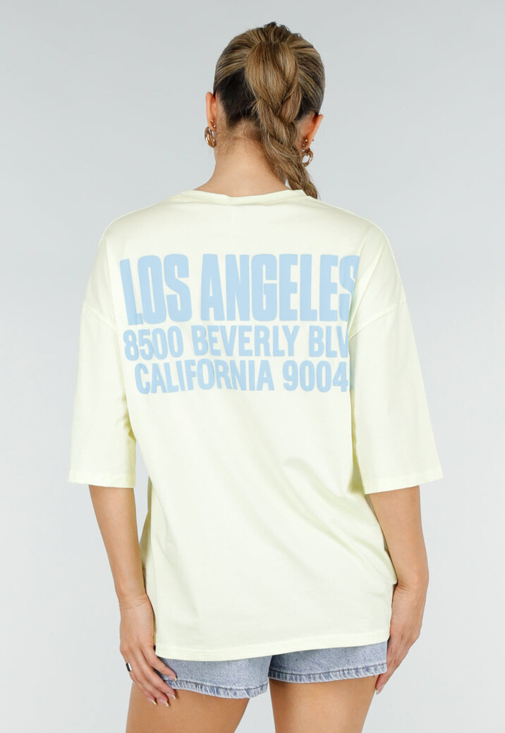Lichtgeel Oversized T-shirt met Blauwe Tekst en Korte Mouwen