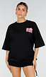 Zwart Oversized T-shirt met Roze Tekst en Korte Mouwen