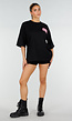 Zwart Oversized T-shirt met Roze Tekst en Korte Mouwen