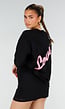 Zwart Oversized T-shirt met Korte Mouwen en Roze Backprint