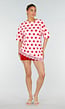 Roze Oversized T-Shirt met Rode Stippen en Kanten Zoom