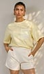 Lichtgeel Gestreept Oversized T-shirt met Iconic Opdruk