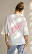 Wit Katoenen Oversized T-shirt met Roze Tekstprint op de Rug