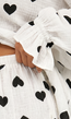 Witte Mousseline Two Piece met Zwarte Hartjes en Ruffles