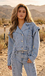 Lichtblauw Denim Jasje met Veterdetails en Ruffle Schouders