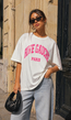 Wit Oversized T-Shirt met Grote Roze Tekstprint