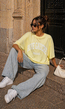 Lichtgeel Oversized T-Shirt met Witte Tekstprint