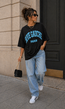 Zwart Oversized T-Shirt met Blauwe Rive Gauche Tekstprint