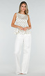 Witte Peplum Top met Zwarte Stippen en Ronde Hals