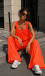 Neon Oranje Stretch Two Piece Set met Mouwloze Top en Wide Leg Broek
