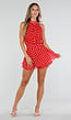 Rode Polkadot Playsuit met Halterhals en Volant