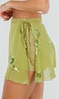 Groene Skort met Overslag, Striksluiting en Bloemendetails
