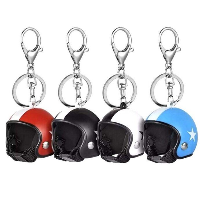 Keychain blue jet helmet with white star
