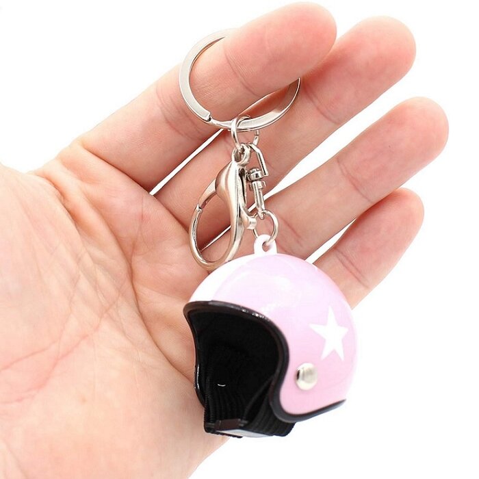 Keychain pink jet helmet with white star