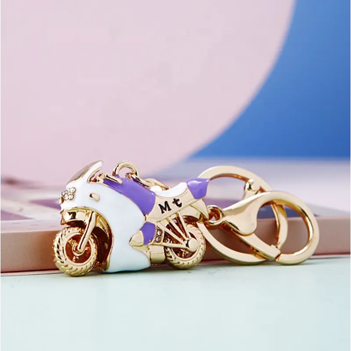Schlüsselanhänger Gold Motorrad Weiß mit Lila