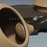 Yixing Qingduanni Xishi tea pot (180 cc, globe screen) Yixing Qingduanni Xishi tea pot (180 cc, globe screen)