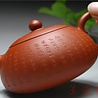Yixing Zhuni Xinjingpian Xishi Teekännchen (170 ml, Kugelsieb) Yixing Zhuni Xinjingpian Xishi Teekännchen (170 ml, Kugelsieb)