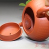 Yixing Zhuni Xinjingpian Xishi Teekännchen (170 ml, Kugelsieb) Yixing Zhuni Xinjingpian Xishi Teekännchen (170 ml, Kugelsieb)