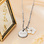 KAYA sieraden Necklace 'Balls' with Mother of Pearl Flower and Engraving | Stainless Steel