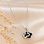 KAYA sieraden Pavé Clover Necklace | Stainless Steel - Black