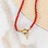 KAYA sieraden Red Necklace Coral with Letter 'Nova Pérola' | Stainless steel