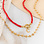 KAYA sieraden Red Necklace Coral with Letter Set 'Nova Pérola' | Stainless steel