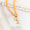 KAYA sieraden Oranje Glasparel Ketting met Letter 'Festival Pearl' | Stainless steel
