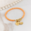 KAYA sieraden Oranje Glasparel Armband met Ovaal Slot ‘Festival Pearl’ - Stel zelf samen | Stainless Steel