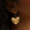 KAYA sieraden “Heart Attack” statement earrings | Stainless gold