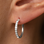 KAYA sieraden Shiny hoop earrings with stones 14mm