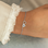 KAYA sieraden Bracelet Two Hearts with Initial | Stainless Steel