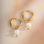 KAYA sieraden Botanical Earrings with White Shells | Stainless Steel