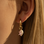 KAYA sieraden Oorringen met Zeester en Parel | Stainless Steel