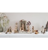 Herder met dieren van de kerststal