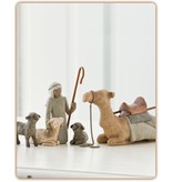 Herder met dieren van de kerststal