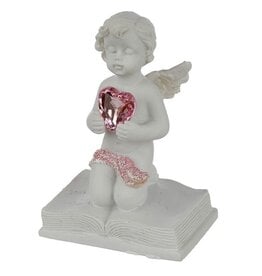 Beeldje engeltje op boek