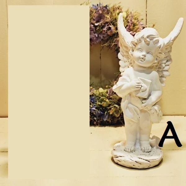 Beeld engel met een brief (prijs is per stuk!)