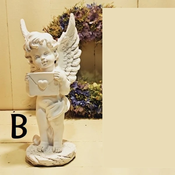 Beeld engel met een brief (prijs is per stuk!)