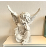 Beeld engel zittend