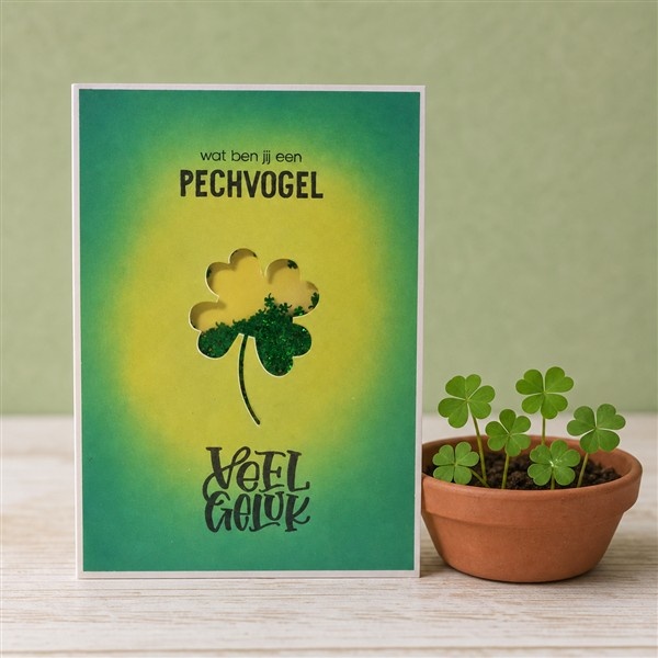 Wenskaart - Pechvogel (schudkaart met klavertjes vier)