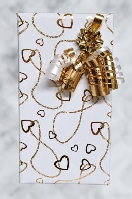 cadeaupapier gouden hartjes