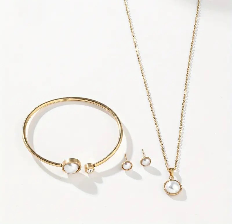 SOHI Goldplated Vrouwen Sieradenset met hanger ketting en oorknopjes en armband, goud
