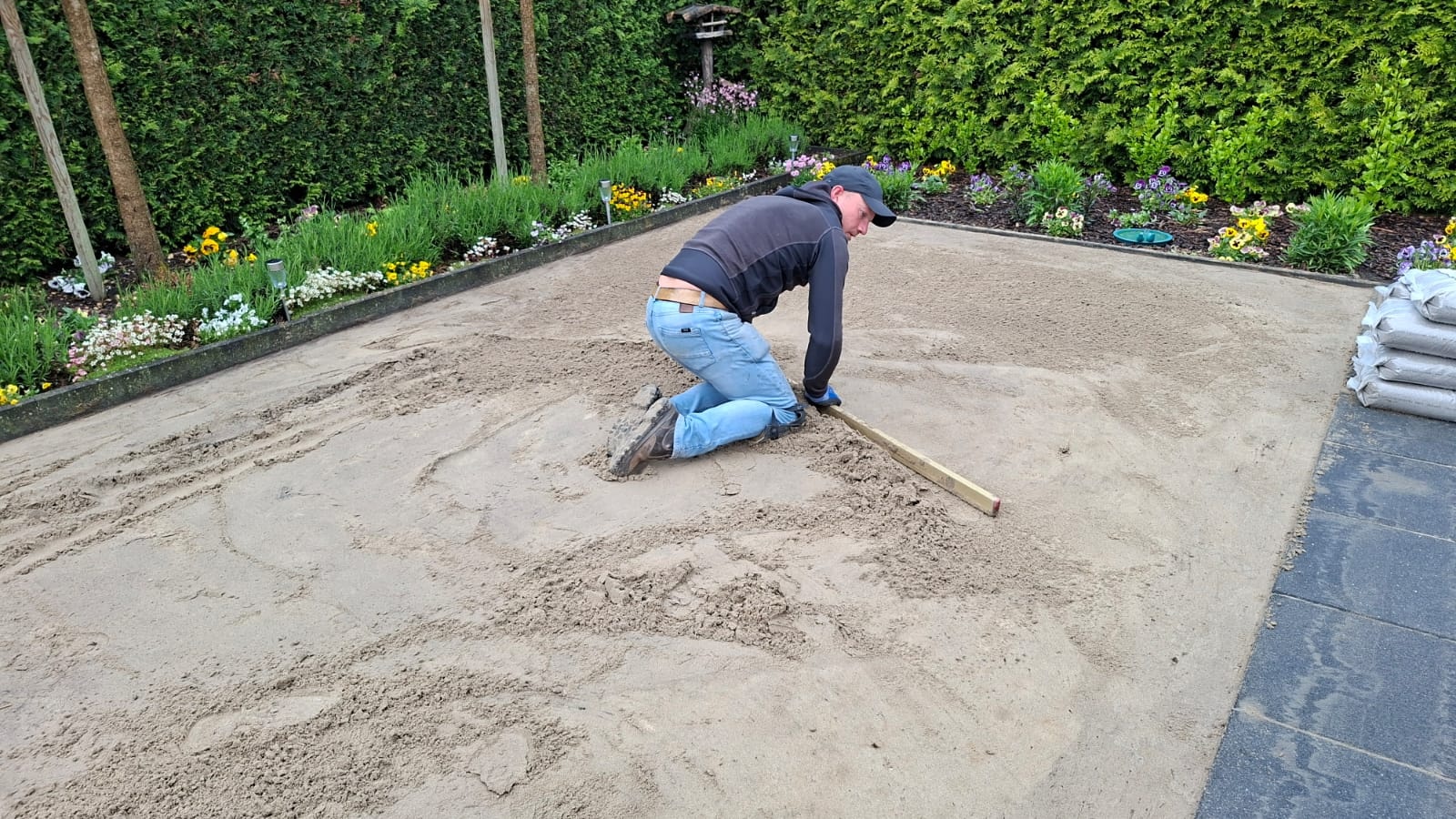 Plaatsing van het zandbed