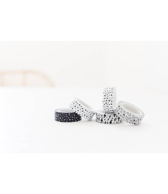 Masking tape wit met zwarte plusjes