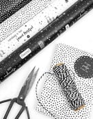 Rol cadeaupapier wit met zwarte dots 50x300cm