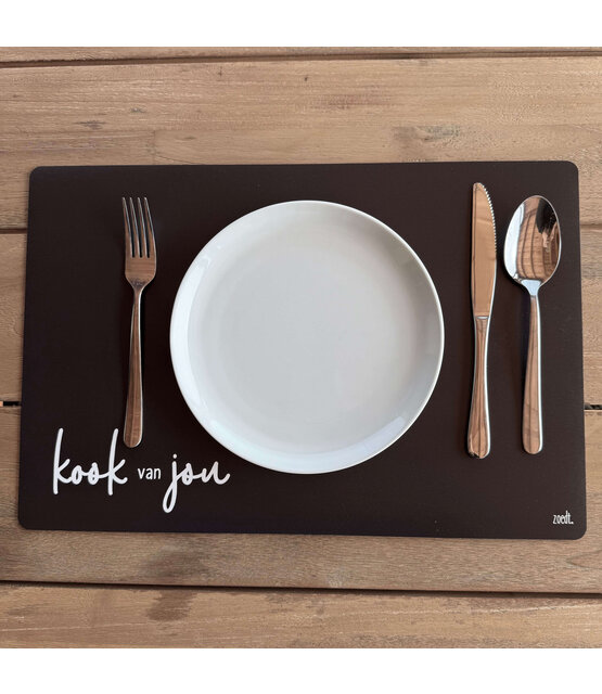 Placemat van zwart vinyl met de speelse tekst ‘Kook van jou’ – een stijlvolle en praktische toevoeging aan jouw eettafel