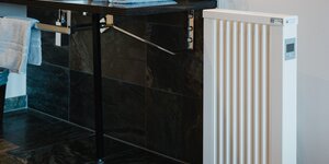 Waar moet ik een radiator in de badkamer plaatsen?
