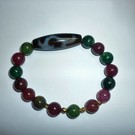 Бусина Дзи "руи" в браслете из агата